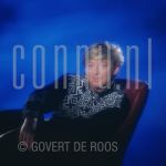 30-01-1990 Benny Neyman at studio in Amsterdam. 

[keywords]Posed, Half Length, Eyecontact, Smiling, Chair[/keywords]